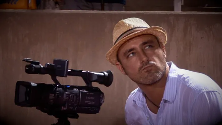 Chris on set with hat