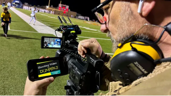 Chris at football game behind the scenes