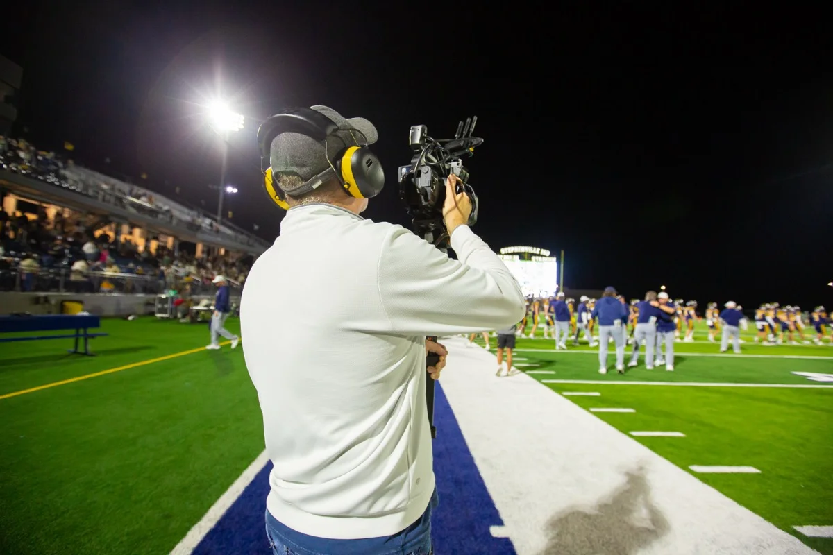 Chris Chamberlain filming football